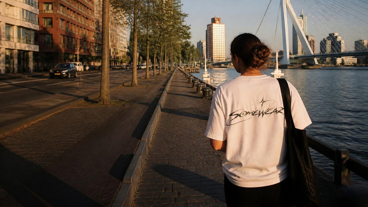 Somewear back logo tee walking along the Rotterdam waterfront